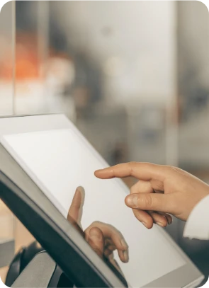 Guest interacting with a touchscreen ordering device
